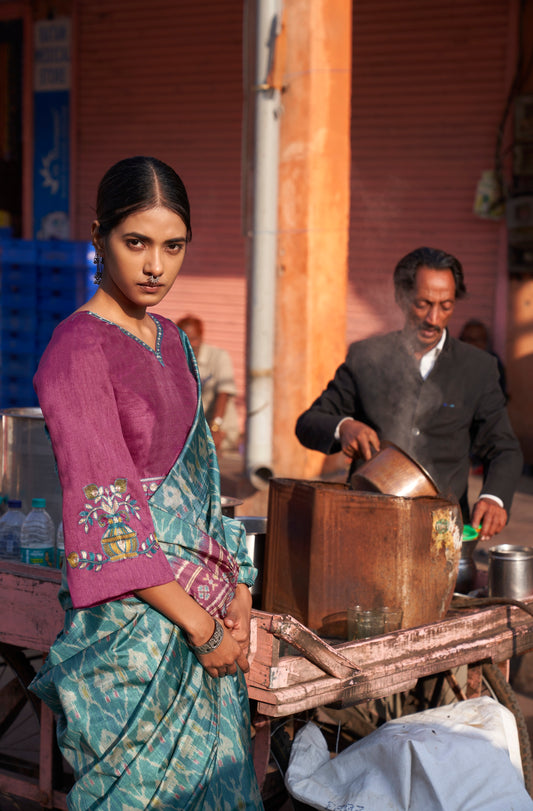 Turquoise Ikkat Print Dolphin Fabric Saree